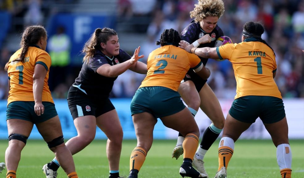 BRIGHTON, ENGLAND - SEPTEMBER 06: Ellie Kildunne of England is tackled by Adiana Talakai (L) and Lydia Kavoa of Australia during the Women's Rugby World Cup 2025 Pool A match between England and Australia at Brighton & Hove Albion Stadium on September 06,