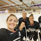 Kelly Murray (left) poses with her teammates of SDE