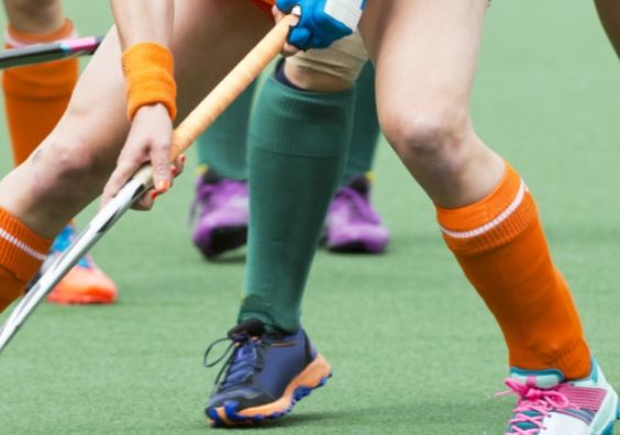 Women hockey players on the ball Women hockey players on the ball