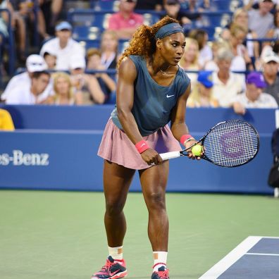 Serena Williams preparing to serve