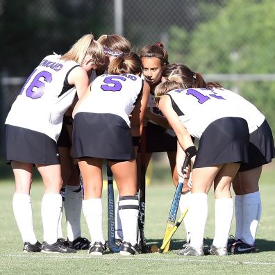 Field Hockey - team huddle